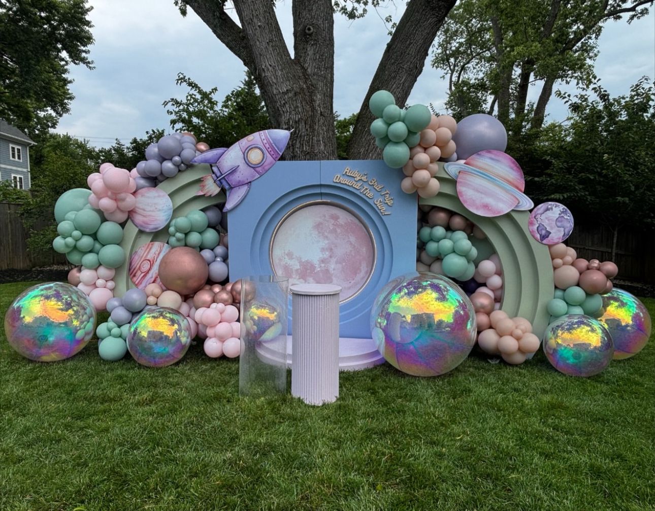 Space-Themed Birthday Party Backdrop with Balloon Garland, Planets & Rocket Decorations